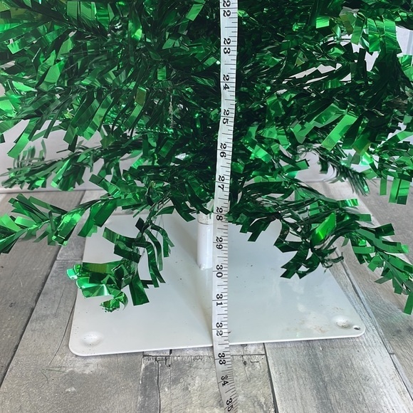 Red and green tensile Christmas trees. Approx 2 1/2 ft tall. Sits on metal base. - Picture 4 of 7